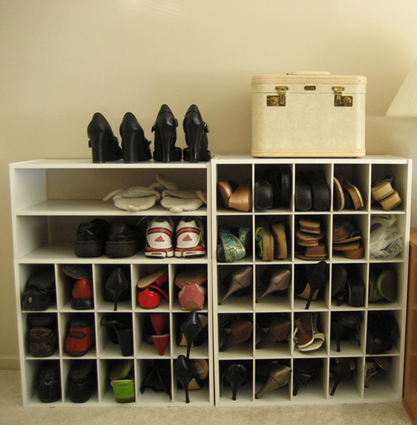 Photo of two, mostly-filled, shoe racks