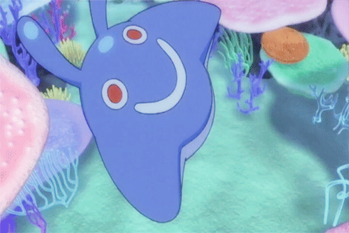 Gif of Pokemon anime. Mantyke shows off smiley-face pattern on back before flipping up and swimming toward the viewer.